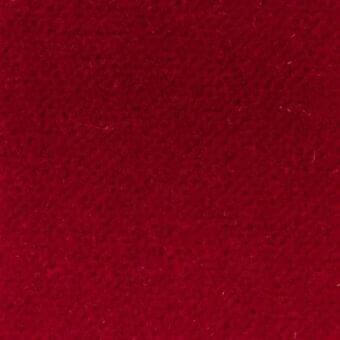 Deep red looped pile fabric texture with a plush, uneven surface and subtle variations in height, suggesting a durable synthetic material.